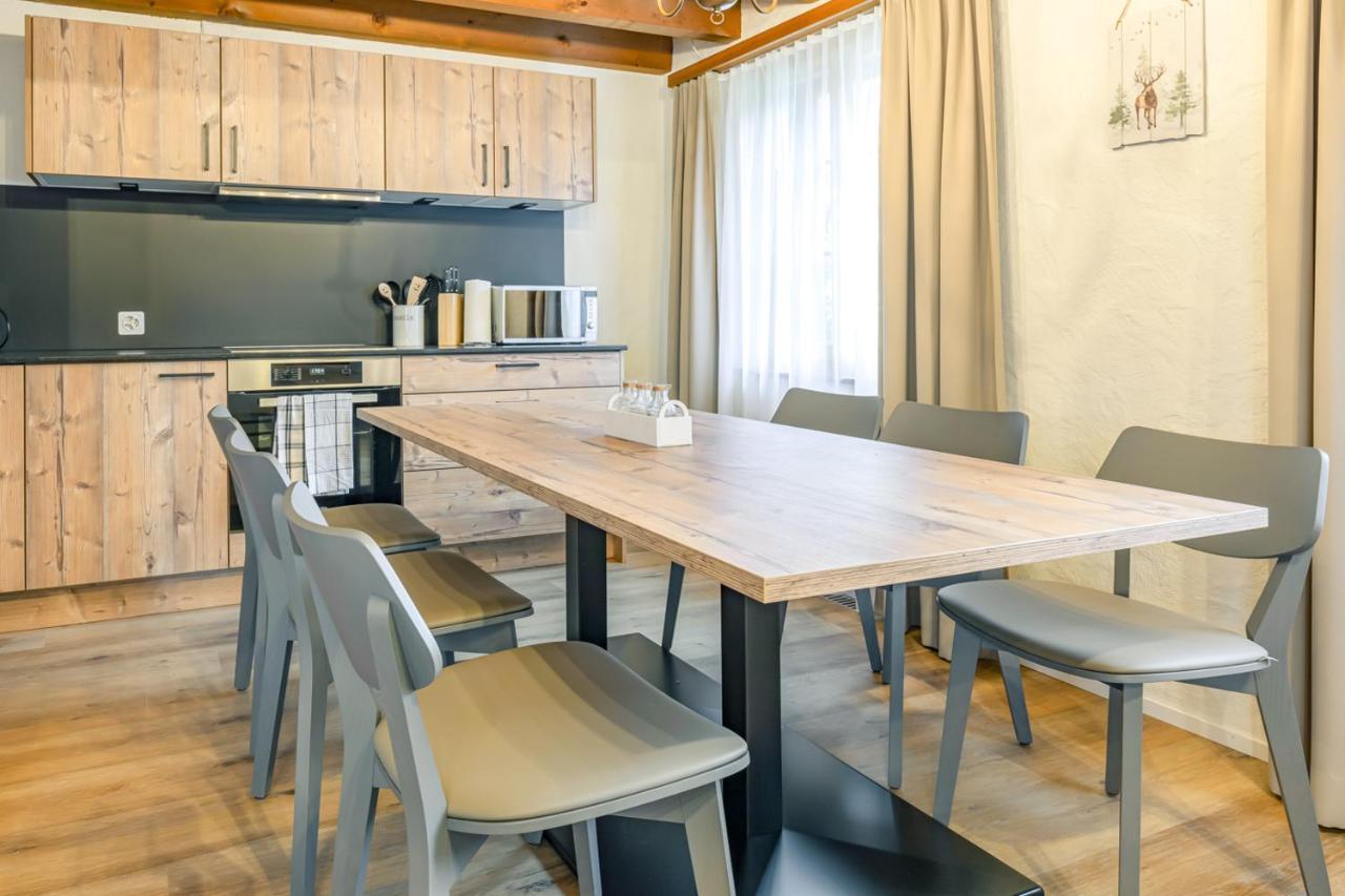 Apartment Eiger - Aare Jungfrau Ag Гриндельвальд Экстерьер фото